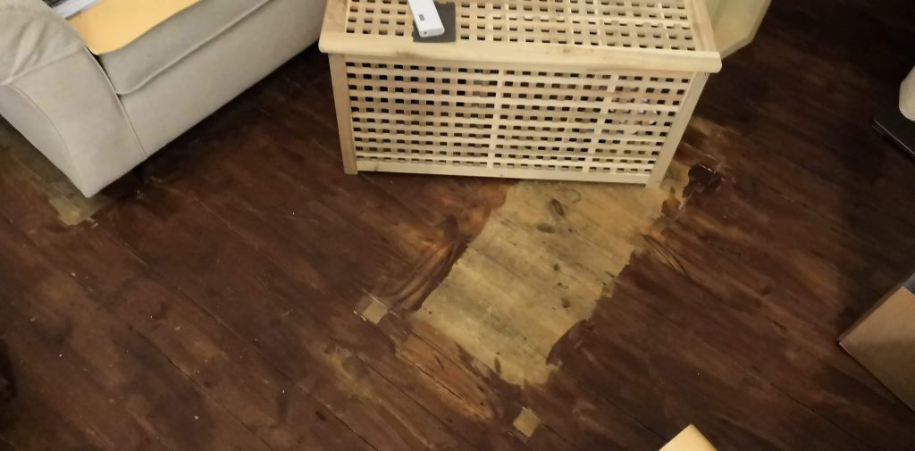 unpainted floorboards