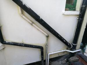The jumble of exterior pipework